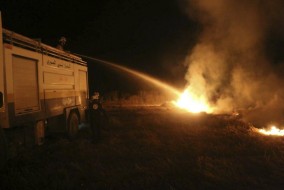 Crop fires, a weapon of war, ruin Iraqi, Syrian harvests